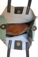 Interior view of python print handbag, spacious and stylish.