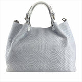 Light gray braided leather handbag, close-up view