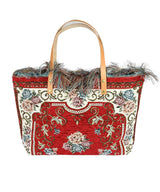 a red and white purse with a handle