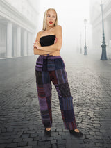 Handmade Boho Cotton Patchwork Pants in purple tones, featuring a relaxed fit and stonewashed fabric. Ethical and unisex design for casual wear.