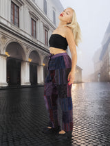 Bohemian-style cotton patchwork pants with an adjustable waist tie. Comfortable and eco-friendly, perfect for a unique and artistic fashion statement.