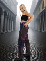 Stonewashed cotton patchwork pants with a bohemian aesthetic. Features a drawstring waist and relaxed fit for ultimate comfort and style.