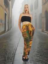 Boho cotton patchwork pants in orange, handmade with a relaxed fit. Unisex, fair trade design with drawstring waist, perfect for casual wear.