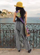 a woman wearing a yellow hat and scarf