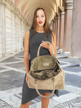 Spacious beige python embossed leather handbag, Italian handmade, displayed open to reveal interior compartments. A stylish and functional fashion accessory.