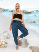 Boho cotton yoga pants with ocean backdrop