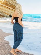 Blue cotton boho pants near ocean waves