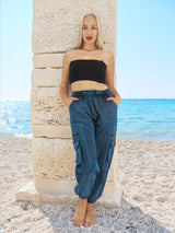 Casual boho cotton pants on sunny beach