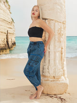 Hippie yoga pants in blue cotton on sandy beach