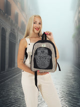 Model holding a handmade cotton hemp backpack with intricate embroidery, highlighting its stylish and eco-friendly design for everyday use.