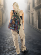 Ethnic-inspired handmade cotton hemp backpack featuring vibrant woven fabric, worn by a model walking down a cobblestone street. Great for casual and travel use.