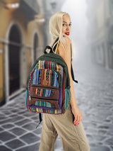 Handmade large cotton hemp backpack with colorful tribal patterns, worn by a model in a vintage street setting. Ideal for school, travel, and daily use.