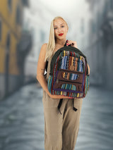 Colorful handmade cotton hemp backpack with a sturdy design, presented by a model in a misty urban setting. A fashionable and functional school or travel bag.