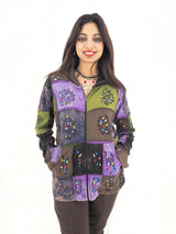 a woman standing in front of a white background