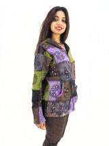 a woman is posing for a picture wearing a jacket