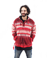 a man with a beard wearing a red and black jacket