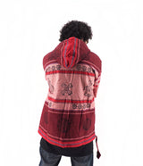 a person wearing a red and black jacket