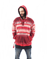 a man wearing a red and white striped hoodie