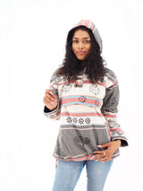 a woman in a hoodie is posing for a picture