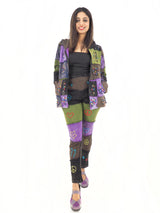 a woman standing in front of a white background