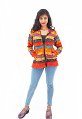 a woman standing with her hands on her hips