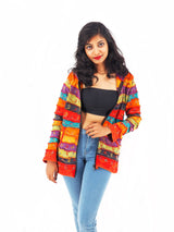 a woman in jeans and a crop top posing for a picture