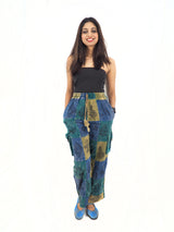 a woman standing in front of a white background