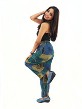 a woman in a black top and blue pants