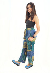 a woman in a black top and blue pants