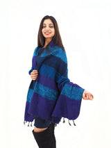Ethically handmade Yak Wool Shawl in blue and purple, elegantly draped. A versatile throw, perfect for warmth, meditation, or as a stylish wrap.