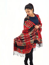 a woman wearing a red and black scarf