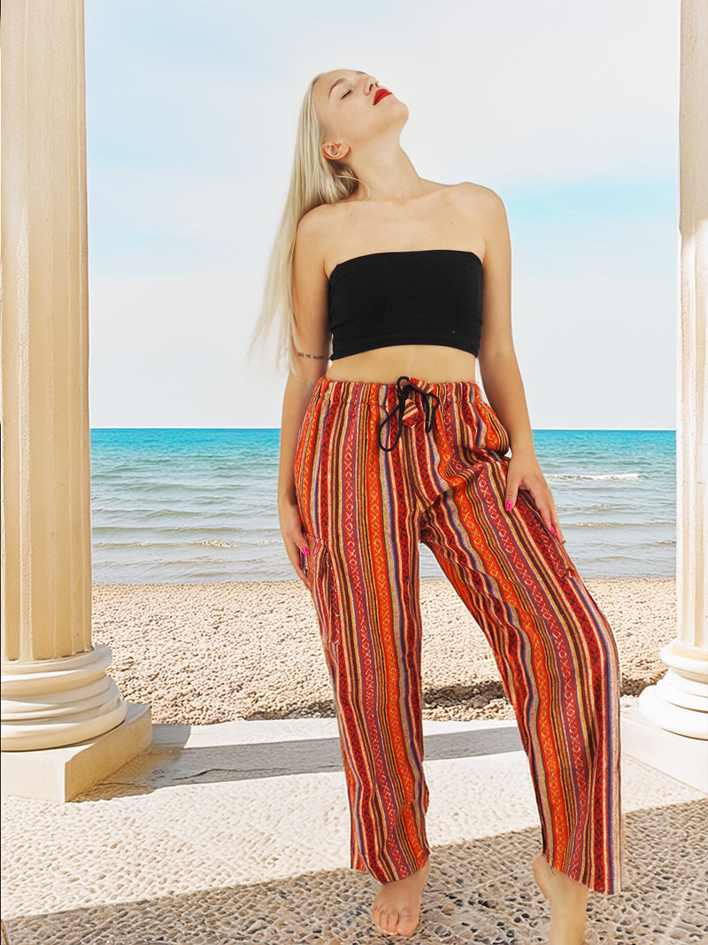 Casual red stripe pants with ocean backdrop