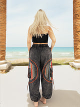 Back view of gray boho pants near beach