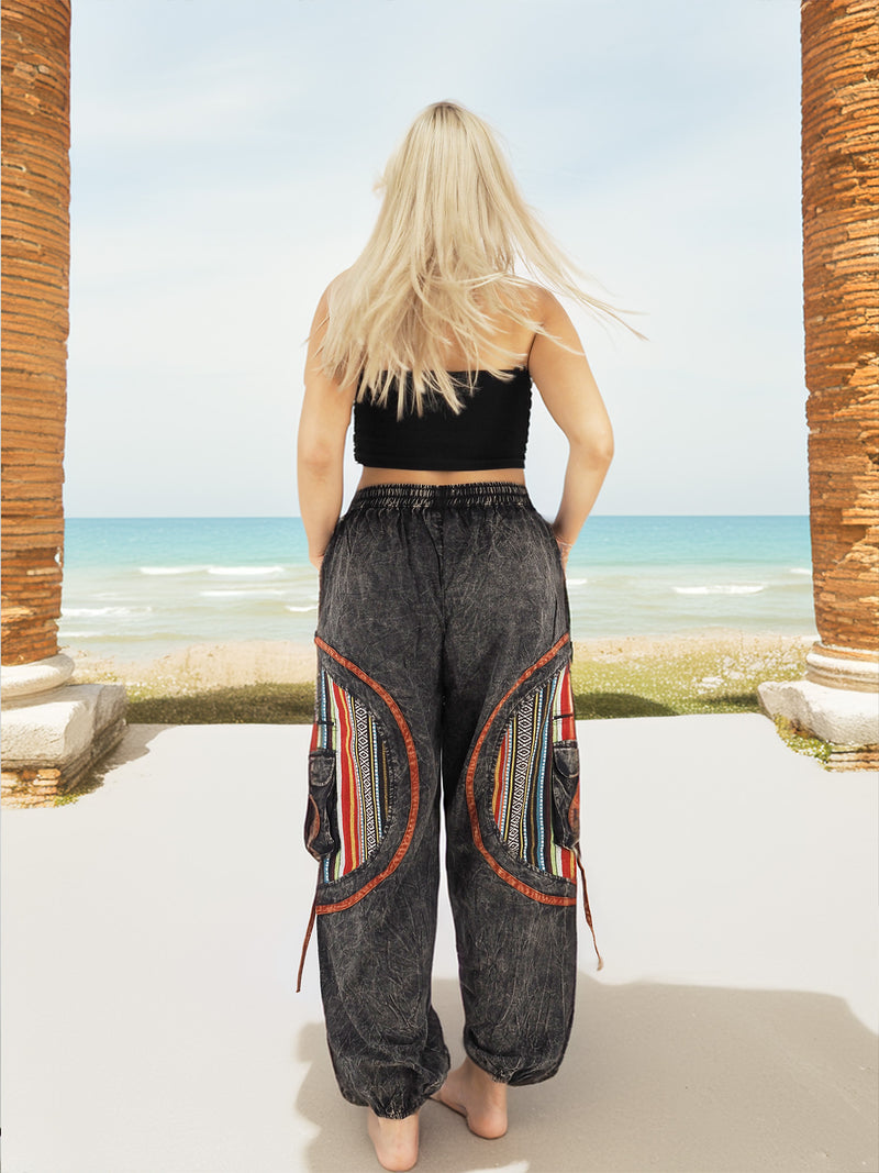 Back view of gray boho pants near beach