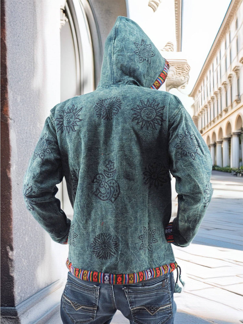 a man in a green jacket is standing on a sidewalk