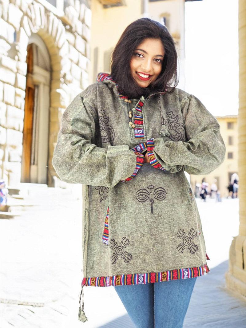 a woman standing in front of a building