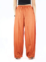 Solid Color Unisex Drawstring Genie Pants In Orange OS